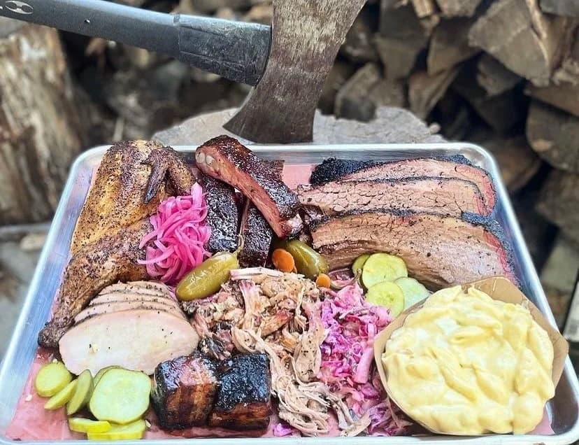 Texas craft BBQ platter with smoked meats and homemade mac n cheese